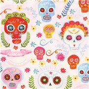 Tela rosa algod&oacute;n calaveras de az&uacute;car floral
