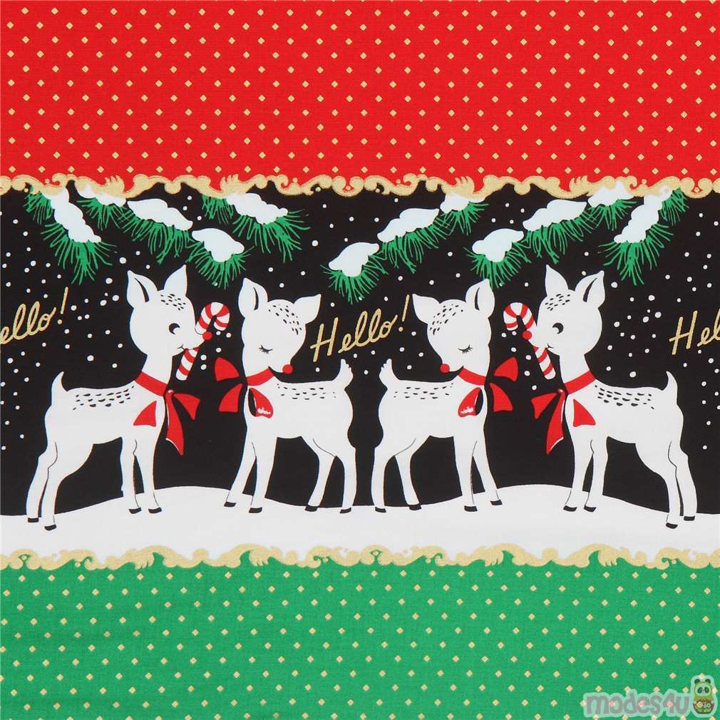 Michael Miller metallic gold doubleborder reindeer fabric by Michael