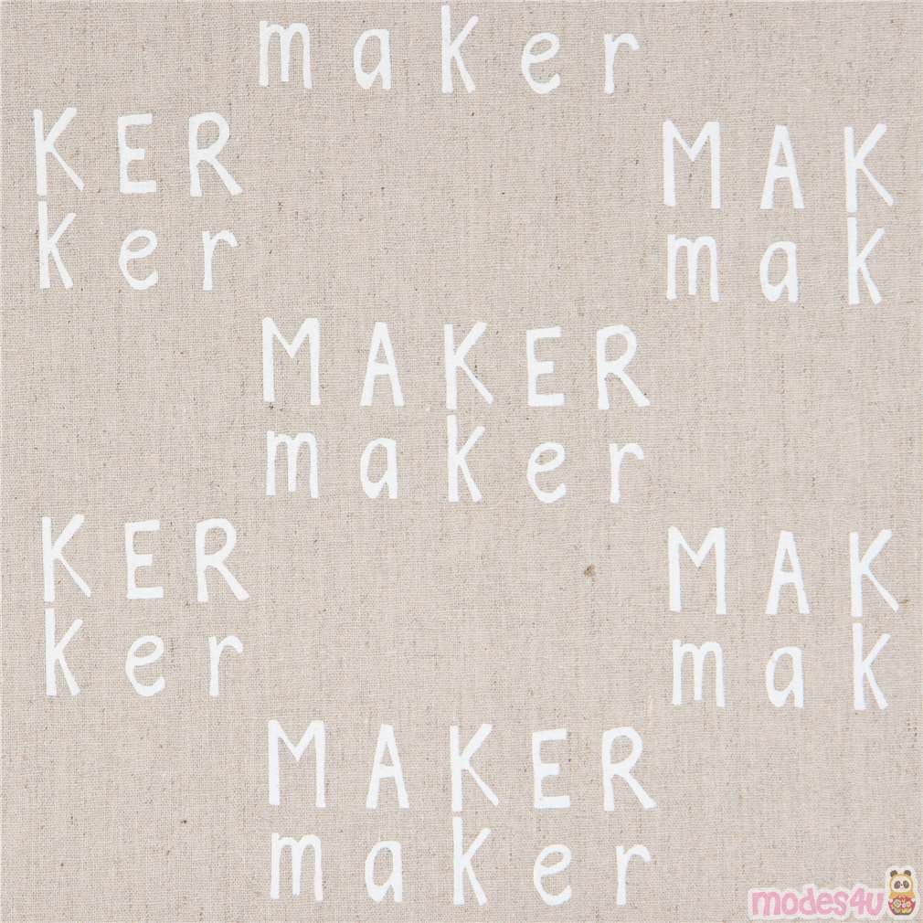 natural color with white text Canvas fabric Andover USA Maker Maker