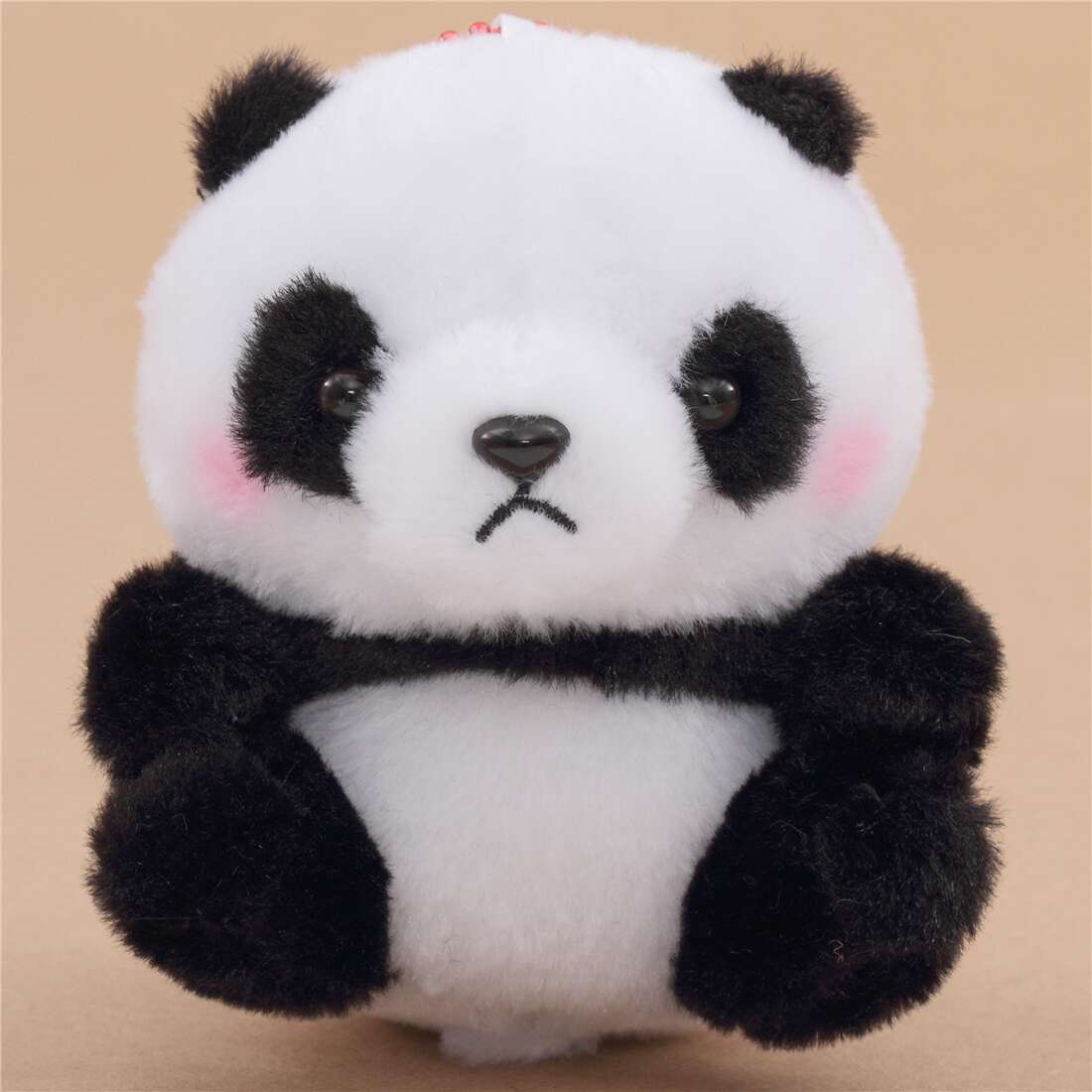 small stuffed panda bear