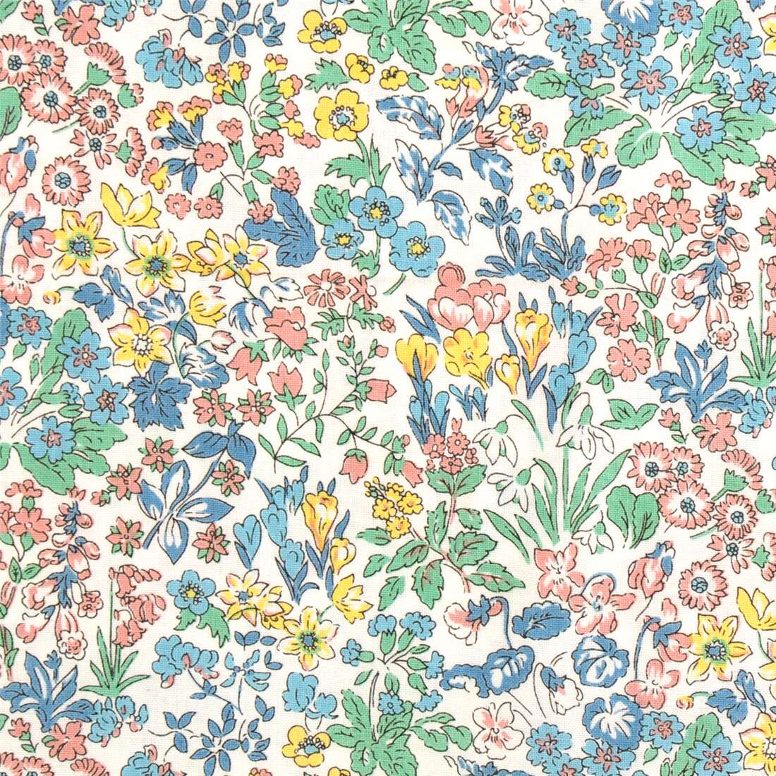 white fabric with pink green blue yellow florals foliage by Liberty ...