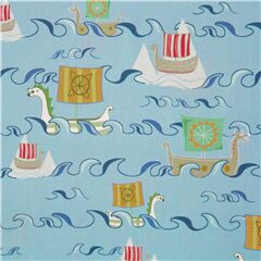 Tissu en coton bleu avec des bateaux drakkar multicolores Tissu par Quilting Treasures