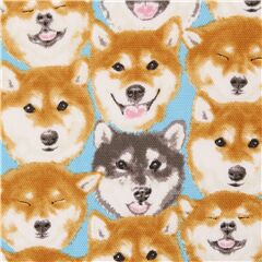 Tissu Oxford en coton bleu avec des ttes de chiens shiba inu marron Tissu par Kokka