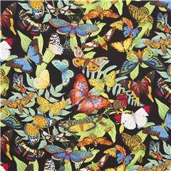 Tissu en coton noir avec des papillons multicolores et des feuilles Tissu par Elizabeth's Studio