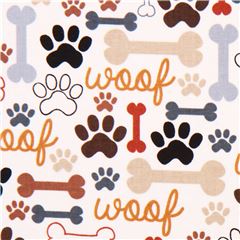 Tissu crme Timeless Treasures, avec des os de chien marrons Tissu par Timeless Treasures