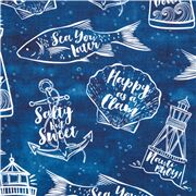 Tissu en coton bleu avec des icônes de la mer et des mots en blanc