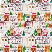 Tissu en coton bleu clair avec des villages d'hiver multicolores, Noël