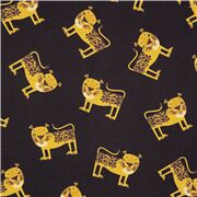 Tissu en coton noir avec des jaguars dans tous les sens, des félins