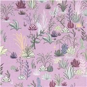 Tissu en coton violet avec des plantes dans un désert