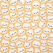 Tissu en coton avec des ronds blancs superposés, buns souriants