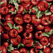 Tissu noir avec pleins de pommes rouges entassées fruits