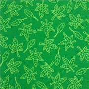 Tissu en coton vert avec des contours de feuilles dessinés