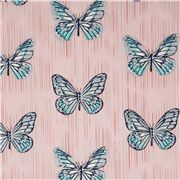Tissu en coton rose avec des papillons bleus argent métallique