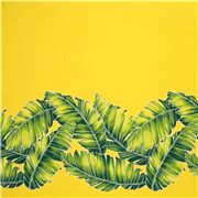 Tissu jaune vif avec des feuilles de bananier vertes