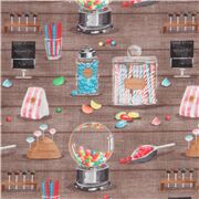 Tissu marron avec des bonbons et des sucreries multicolores