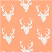 Tissu en jersey Art Gallery Fabrics corail-pêche avec des têtes de cerfs