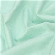 solid mint green shimmery cotton sheeting fabric by Cosmo