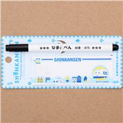 white fabric strip iron-on with train car building and black marker pen
