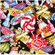 schwarzer Stoff mit Retro Sigkeiten von Timeless Treasures  1