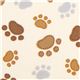 cream Timeless Treasures fabric with funny paw prints 1