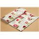 cream designer fabric roses in newspaper 3