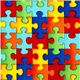 designer fabric with colourful jigsaw puzzle pieces USA 1