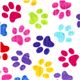 white designer flannel fabric with colourful paw prints 1