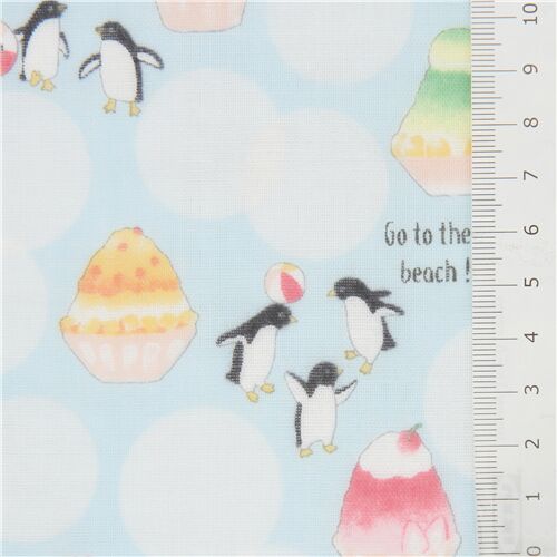 Kokka double gauze fabric in light blue with penguins and shaved ice