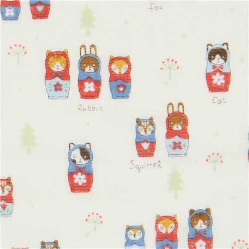 Tissu double gaze crme clair avec des animaux Matriochkas Tissu