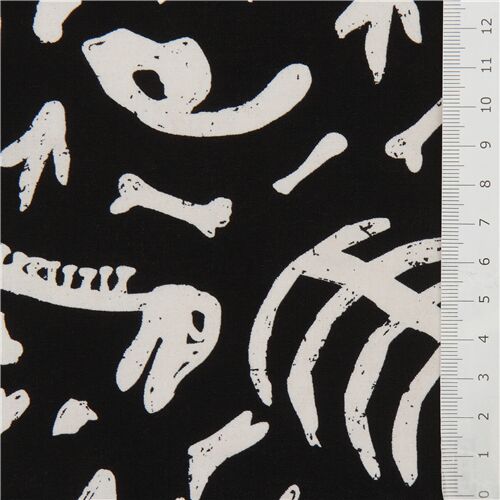 Resto de (31 x 112 cm) - Timeless Treasures tela estampado fluorescente negra con huesos de dinosaur 2