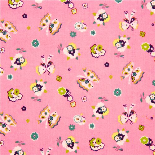 Tissu en coton rose avec des fleurs et papillons multicolores Tissu