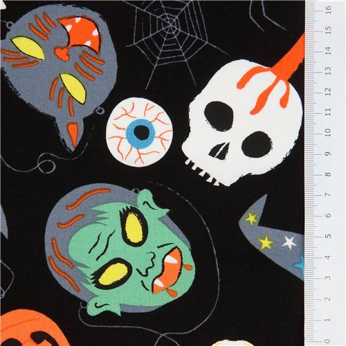 black Alexander Henry Halloween fabric with skulls and cats modeS4u