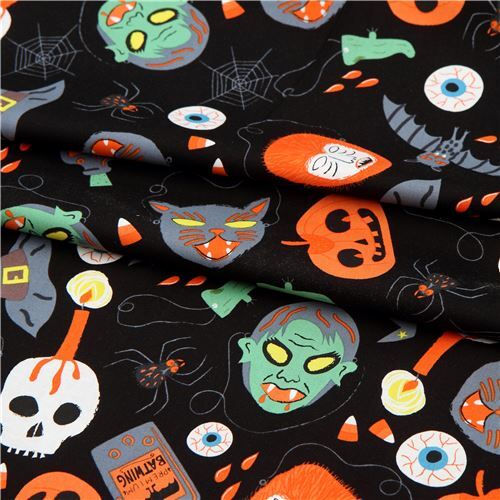 black Alexander Henry Halloween fabric with skulls and cats modeS4u