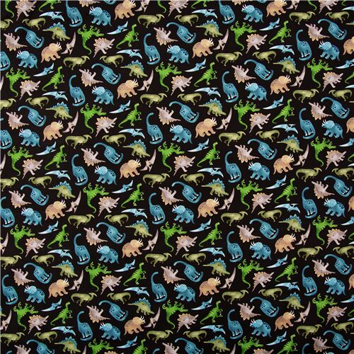 black cotton USA fabric with tumbling dinosaurs by Timeless Treasures ...