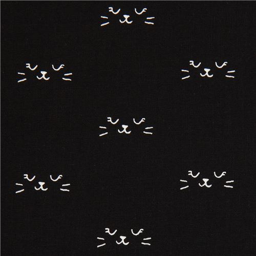 black fabric with cat face animal fabric by Cotton and Steel 1