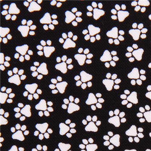 miniature paw prints on black designer fabric from the USA pure