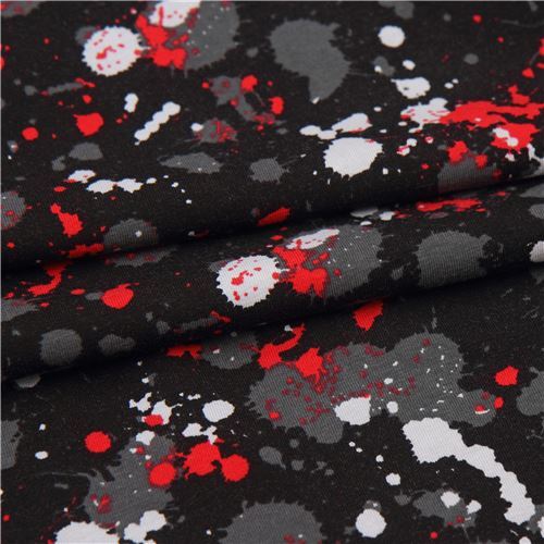 black paint splatter knit fabric by Stof Fabrics modeS4u