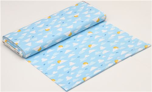 blue clouds sun and bird fabric by Robert Kaufman USA 3