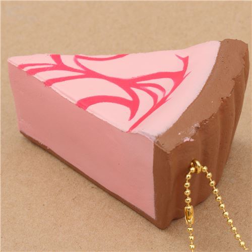 Squishy Cafe de N , part de gteau cheesecake rose avec un coulis fuchsia