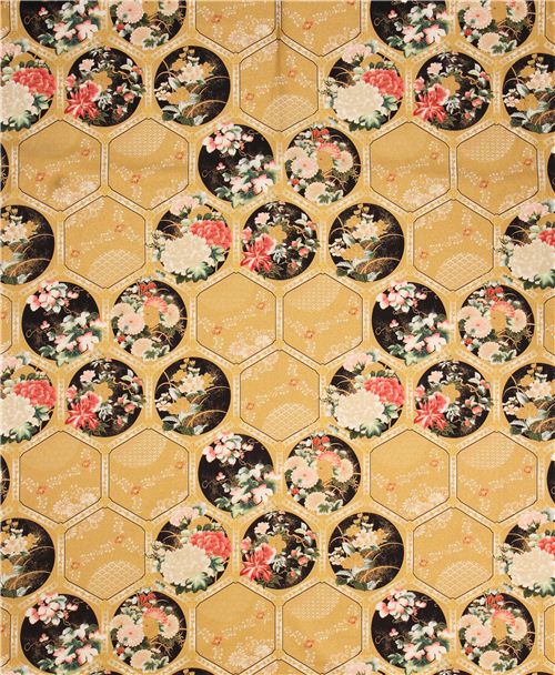 golden flower ornament pattern fabric with gold embellishments by