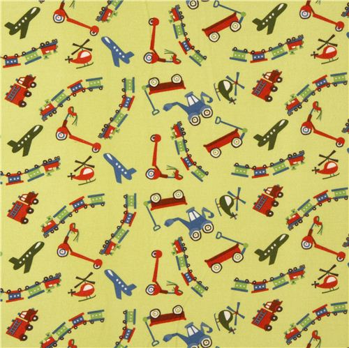 green Riley Blake flannel fabric train airplane scooter 2