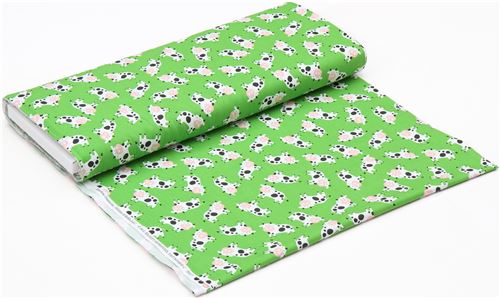 green fabric with cow animal by Timeless Treasures  3