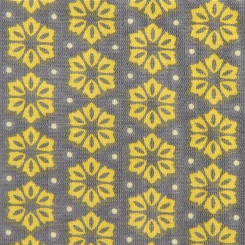 Tissu jersey gris avec des fleurs jaune chartreuse Tissu