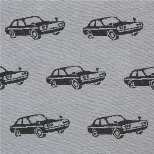 Tela jacquard gris con coche negro de echino Tela