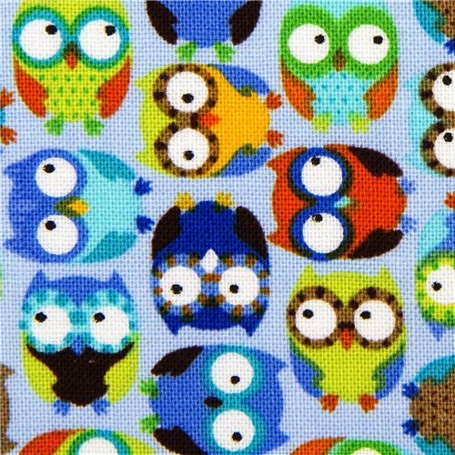 light blue designer flannel fabric with small colourful owls 1