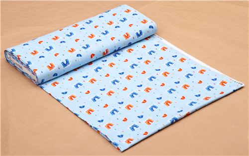 light blue raindrop fabric with umbrellas boots design Michael Miller 3