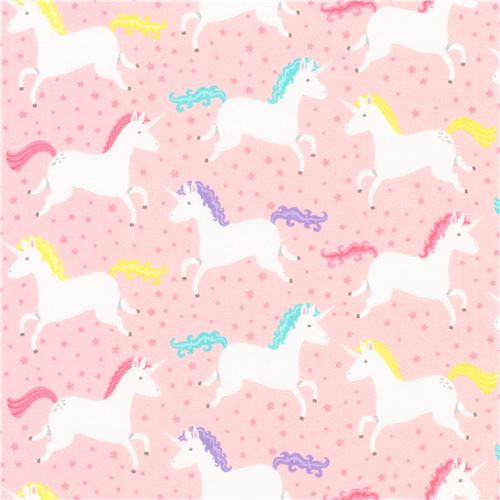 light pink Robert Kaufman fabric with white unicorns and mini stars