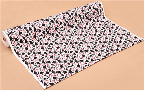 lightweight white Alice in Wonderland Kokka gauze fabric 3
