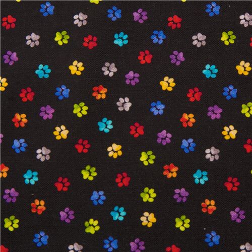 miniature paw prints on black designer fabric from the USA pure