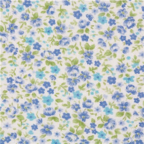 off white smooth knit fabric Japan with small blue flowers densely ...